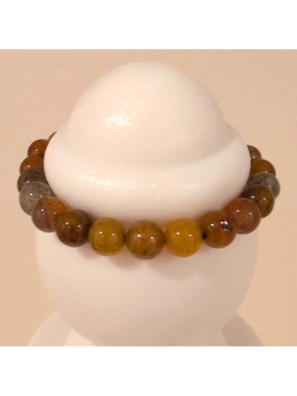 Natural stone agate bracelet, 8mm beads , changes colors with different lights.